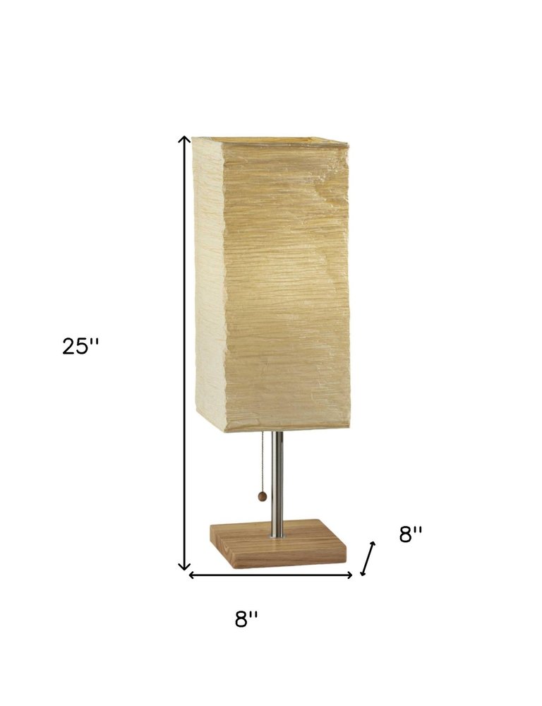 25" Natural Solid Wood And Silver Metal Table Lamp Beige Paper Shade. Table lamp isolated on a plain white background, showing a beige wood surface.