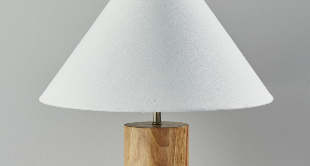 Detail view of 26" Natural Solid Wood Cylinder Table Lamp With White Cone Shade, filling the frame with the white wood texture.