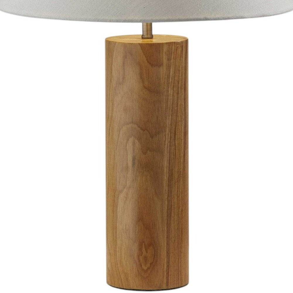 26" Natural Solid Wood Cylinder Table Lamp With White Cone Shade. Table lamp isolated on a plain white background, finished in tan wood.
