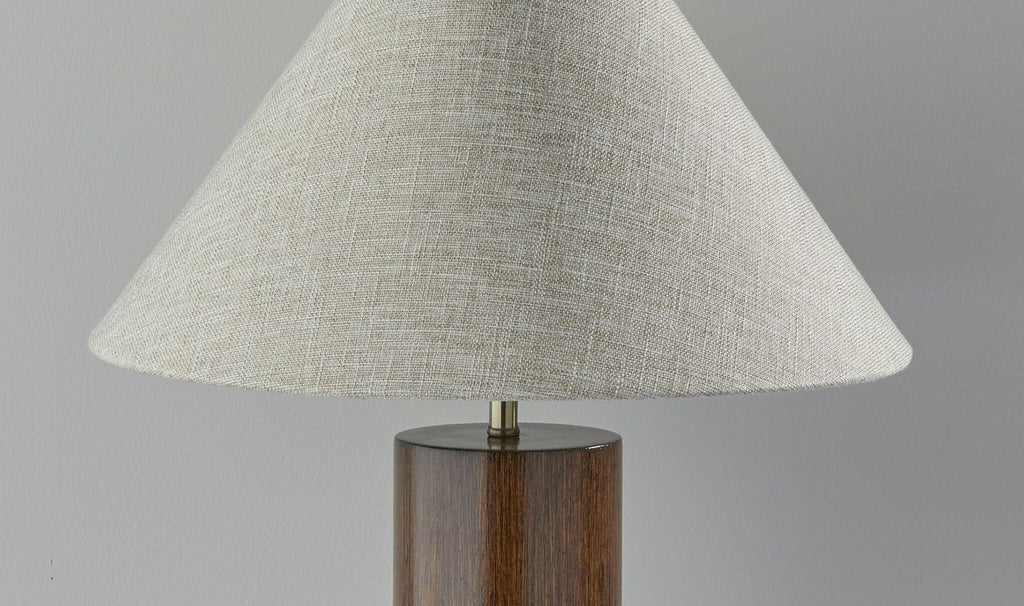 Detail view of 26" Natural Solid Wood Cylinder Table Lamp With White Cone Shade, filling the frame with the wood texture.