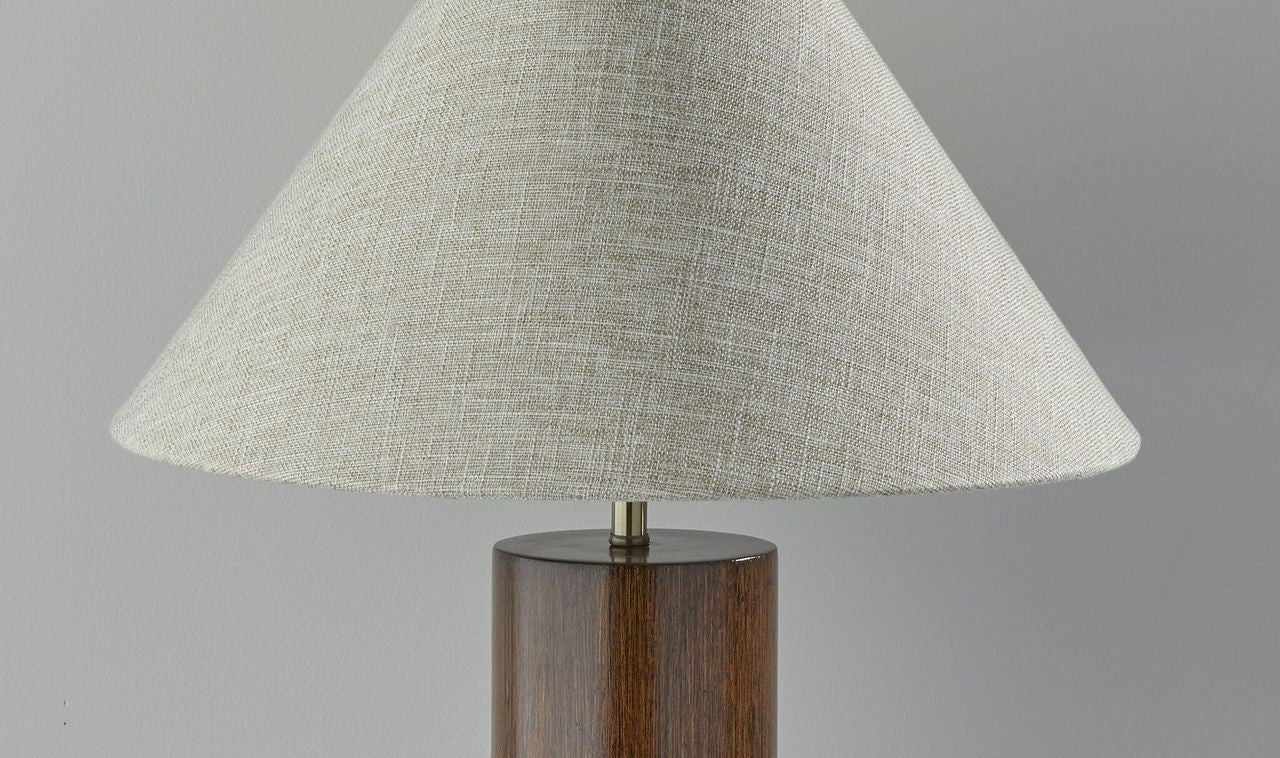 Detail view of 26" Natural Solid Wood Cylinder Table Lamp With White Cone Shade, filling the frame with the wood texture.