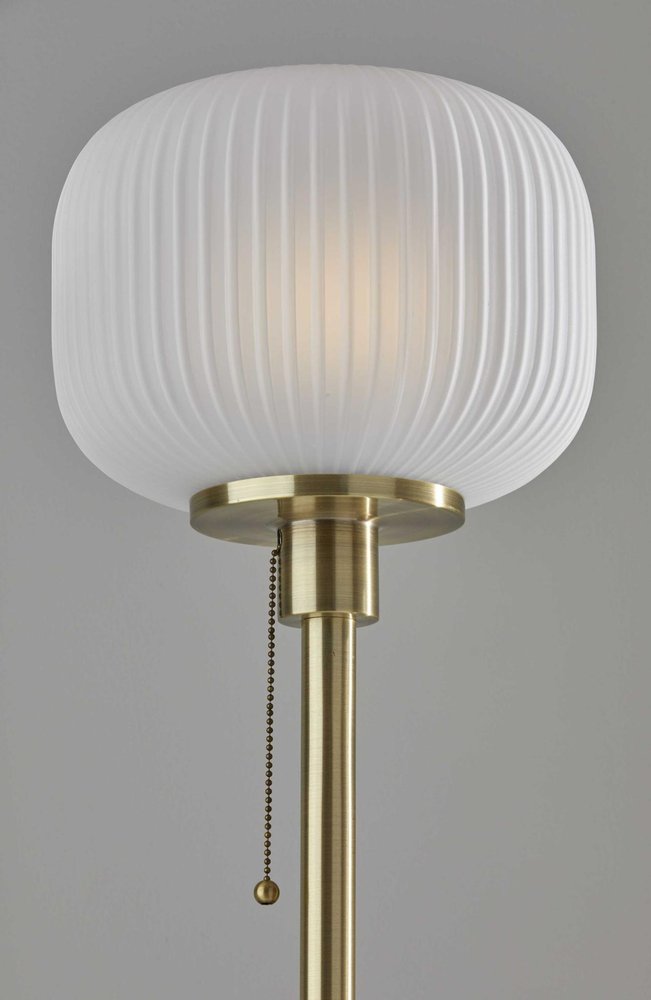 65" Brass Torchiere Floor Lamp With White Acrylic Globe Shade. Floor lamp isolated on a plain white background, finished in white metal.