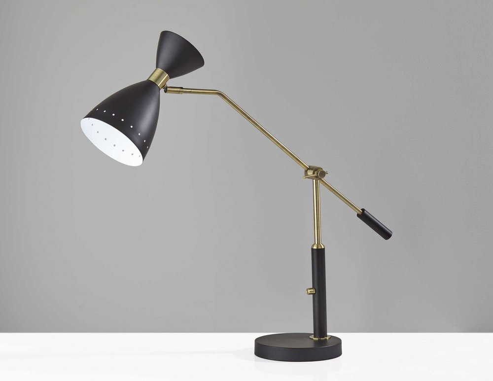 Close-up of 32" Black And Gold Metal Desk Lamp With Cinched Cone Shade showing black metal detail.