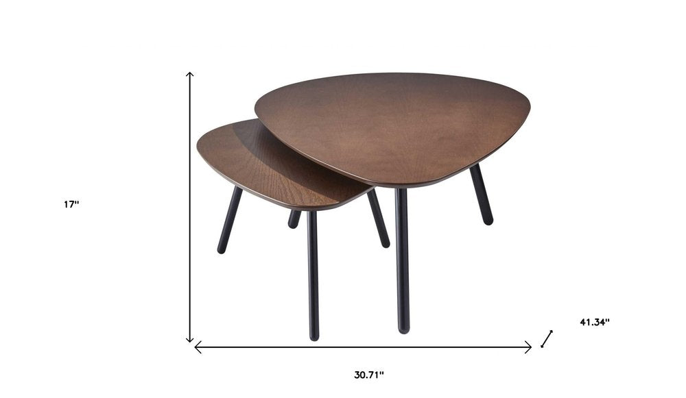 Set of Two Brown And Black Wood And Metal Oval Nested Tables on a white background