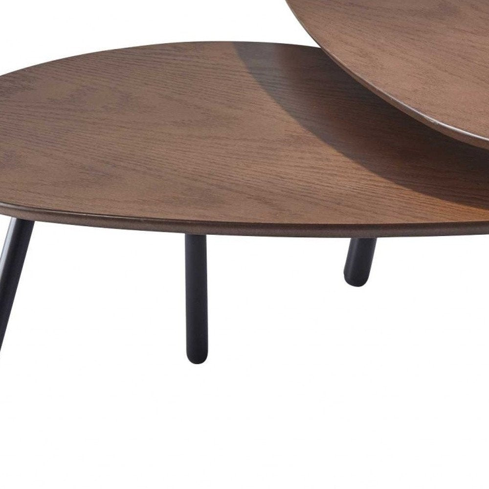 Set of Two Brown And Black Wood And Metal Oval Nested Tables on a white background