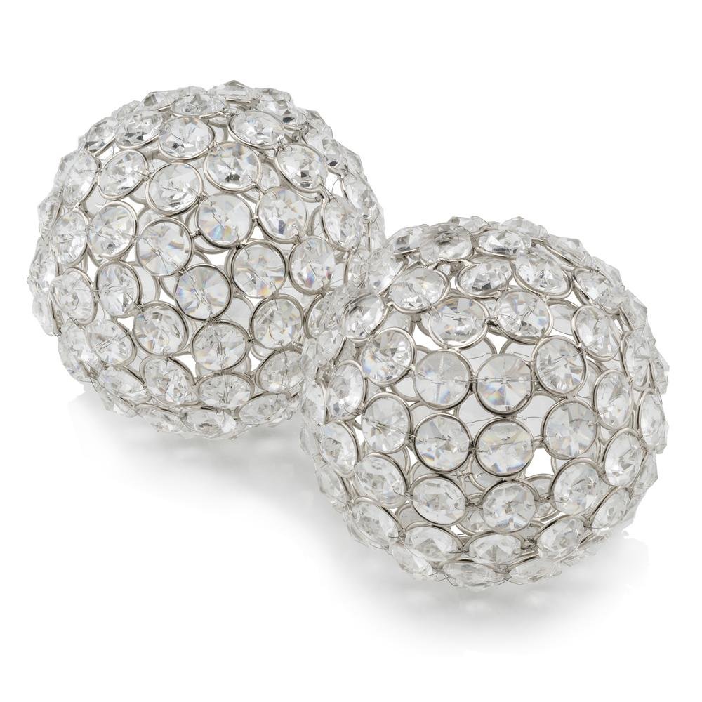 Two clear faux crystal and silver steel decorative orb sculptures on a white background.