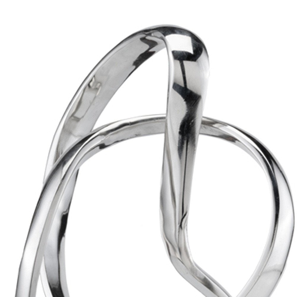 18" Silver and White Marble and Aluminum Sculpture. Sculpture isolated on a plain white background, finished in silver metal.
