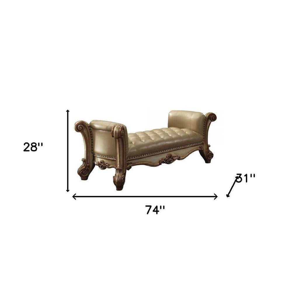 74" Bone and Gold Tufted Faux Leather Upholstered Bench on a white background