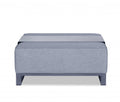 Gray linen upholstered ottoman with a gray tray on top, set against a white background.