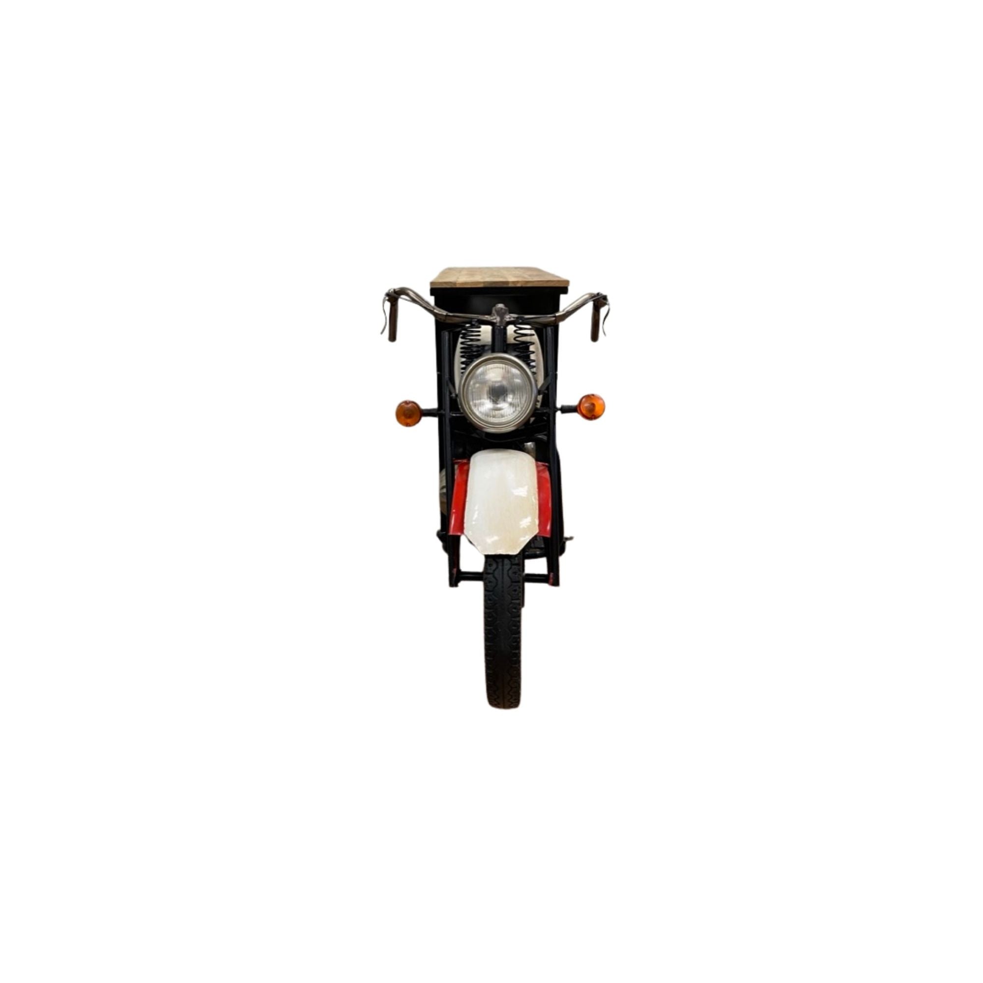 Front view of a red and black metal and wood rolling glider bike bar cart with a wooden top and a single wheel.
