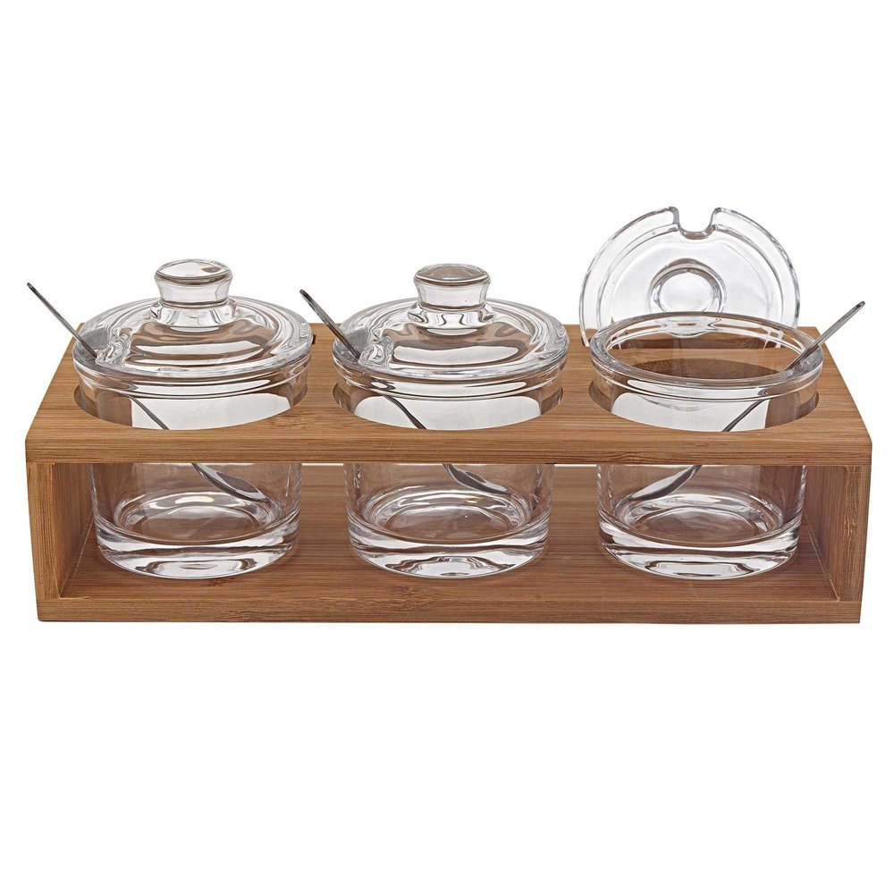6 Mouth Blown Crystal Jam Set With 3 Glass Jars And Spoons On A Wood Stand. Kitchen accessory isolated on a plain white background, showing a glass surface.