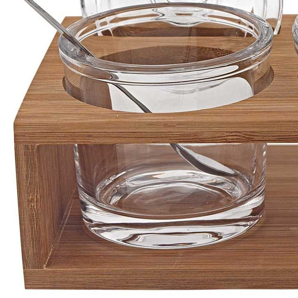 6 Mouth Blown Crystal Jam Set With 3 Glass Jars And Spoons On A Wood Stand detail shot of the glass finish.