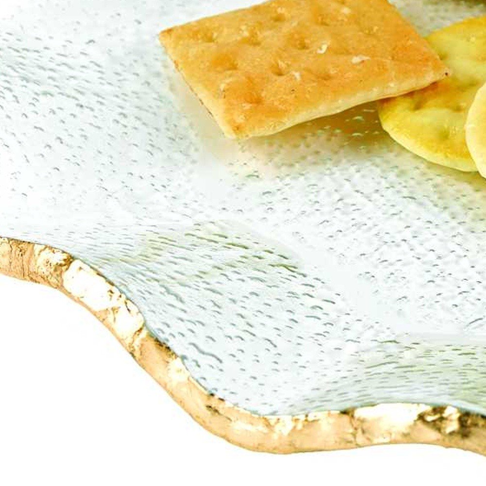 13 Mouth Blown Wavy Edge Gold Leaf Platter Or Charger. Dinnerware isolated on a plain white background, in a gold finish.