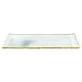 Rectangular clear glass serving platter with textured surface and gold leaf edge on a white background.