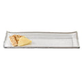 Rectangular clear glass serving tray with textured surface and silver rim, holding crackers and cheese on a white background.