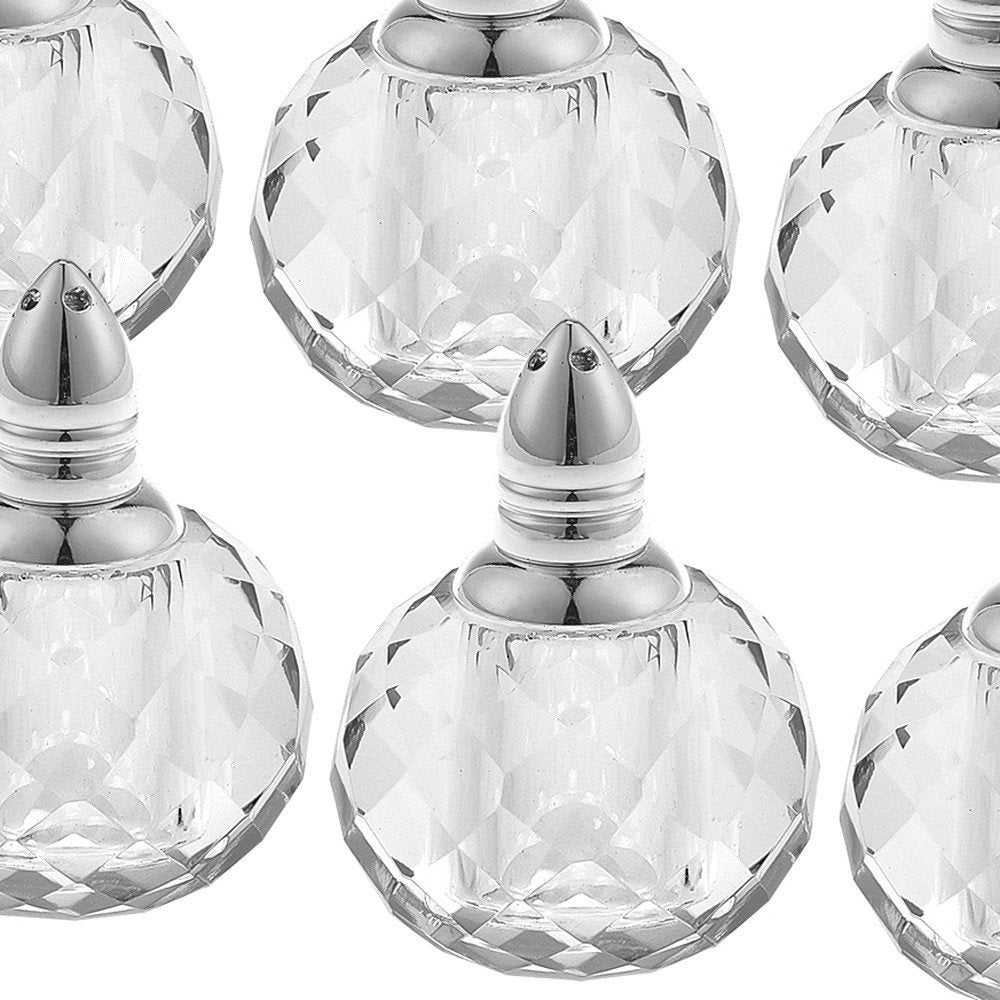 Set of Six Clear And Silver Round Cut Crystal Salt and Pepper Shakers on a white background