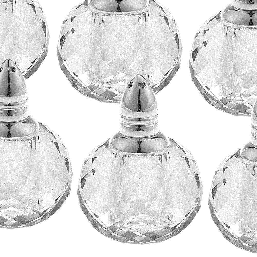 Set of Six Clear And Silver Round Cut Crystal Salt and Pepper Shakers on a white background
