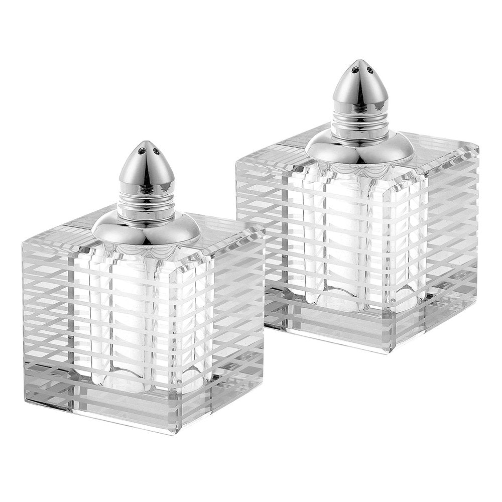 Two clear crystal square pepper shakers with silver striped etching and silver tops on a white background.