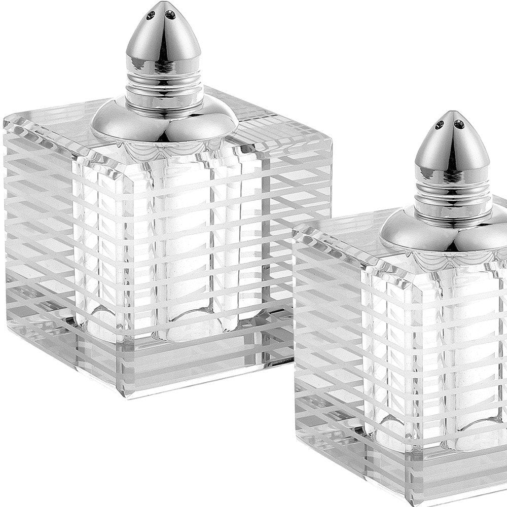 Set of Two Clear And Silver Crystal Striped Pepper Shakers on a white background