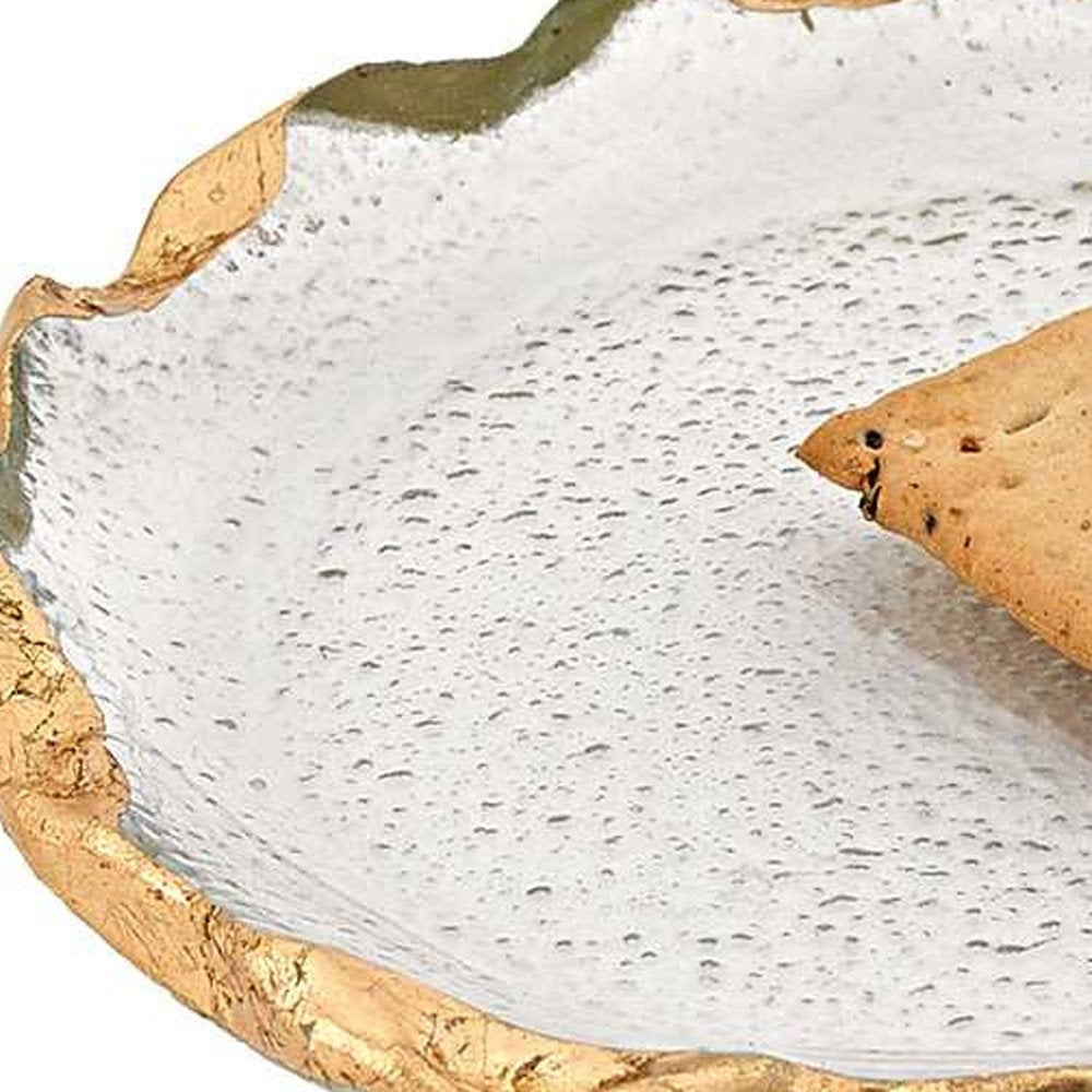14 Glass Oval Edge Gold Leaf Platter. Dinnerware isolated on a plain white background, showing a gold glass surface.