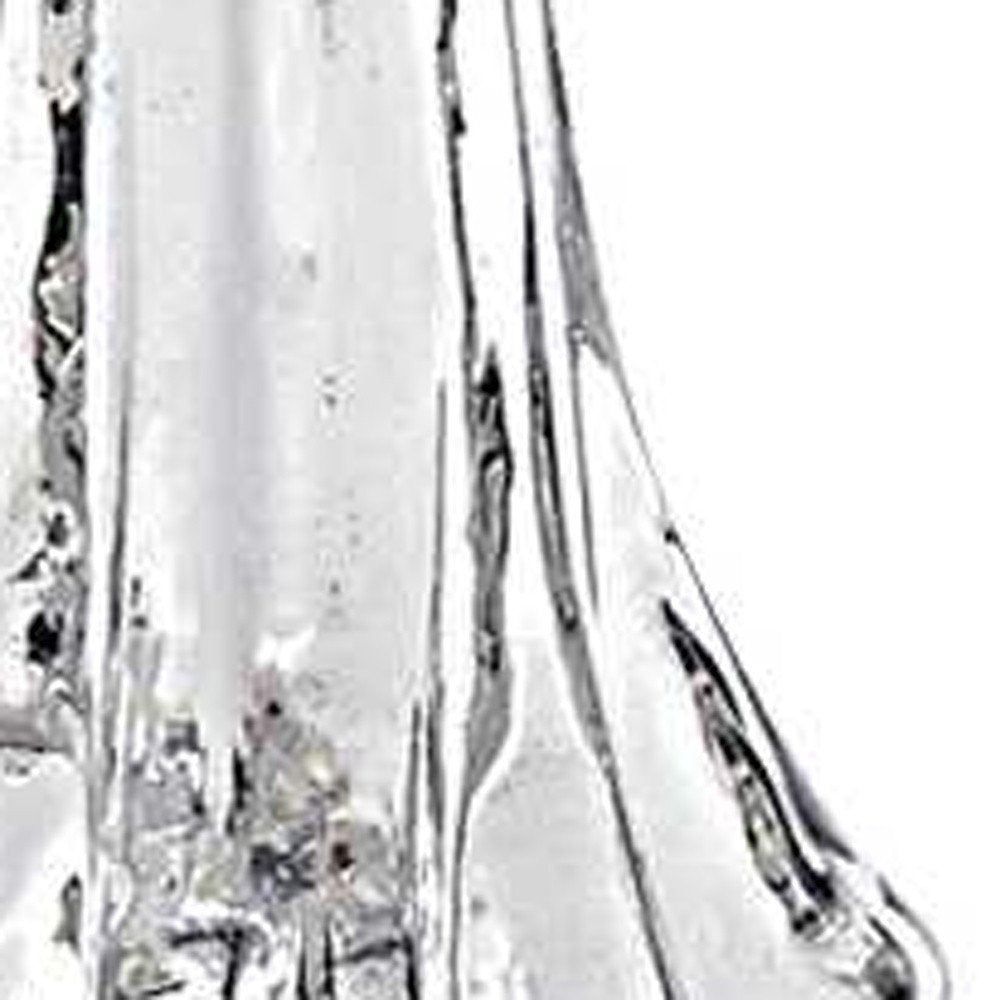 10" Mouth Blown Clear Glass Christmas Tree Sculpture. Sculpture isolated on a plain white background, finished in clear glass.