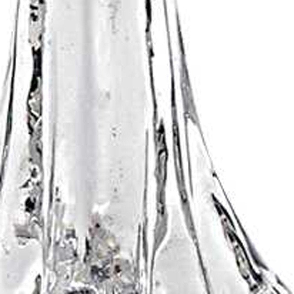 12" Mouth Blown Clear Glass Christmas Tree Sculpture. Sculpture isolated on a plain white background, showing a clear glass surface.
