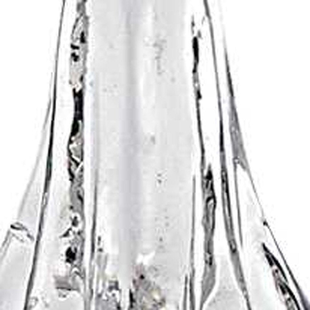 12" Mouth Blown Clear Glass Christmas Tree Sculpture. Sculpture isolated on a plain white background, finished in clear glass.