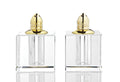 Set of Two Clear And Gold Crystal Pepper Shakers - 3" H x 2.5" W x 2.5" D on a white background