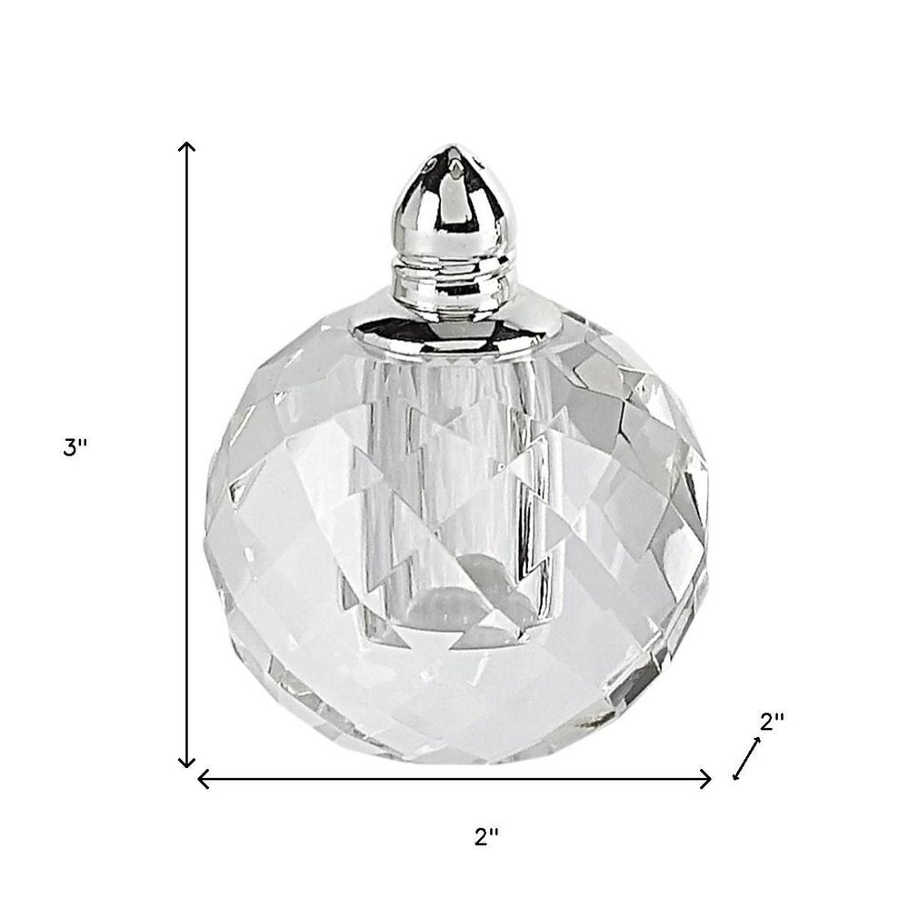 Set of Two Clear And Silver Crystal Geometric Pepper Shakers - 3" H x 2" W x 2" D on a white background