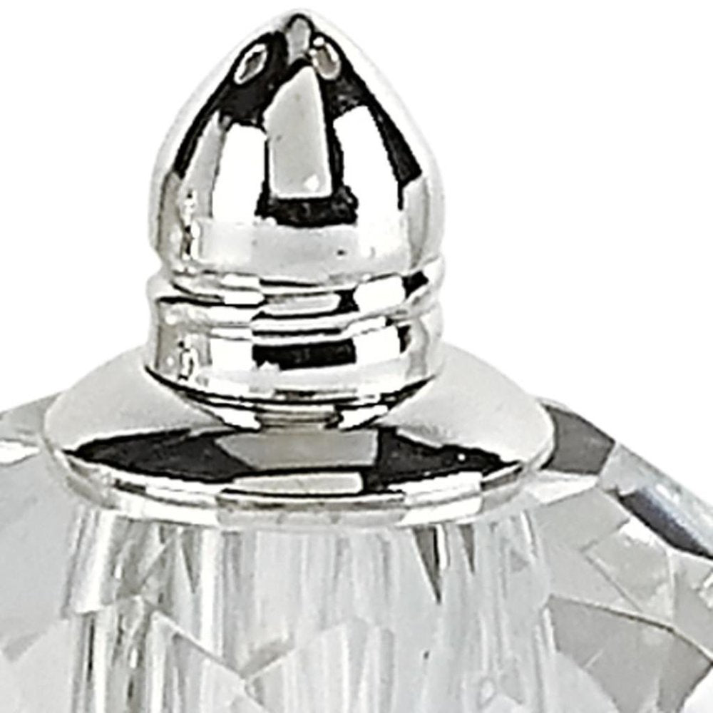 Set of Two Clear And Silver Crystal Geometric Pepper Shakers - 3" H x 2" W x 2" D on a white background