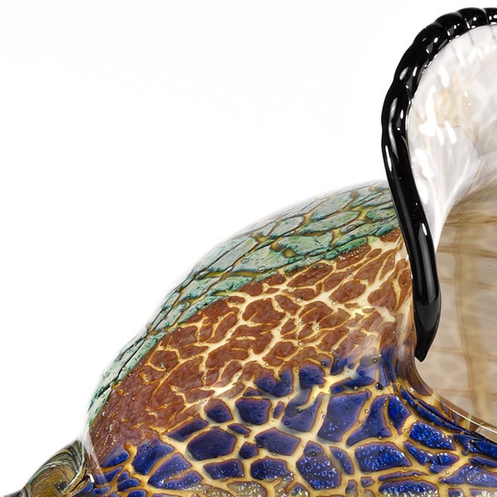 10" Gold Blue Green White Murano Glass Conch Shell Tabletop Sculpture. Sculpture isolated on a plain white background, showing a gold glass surface.