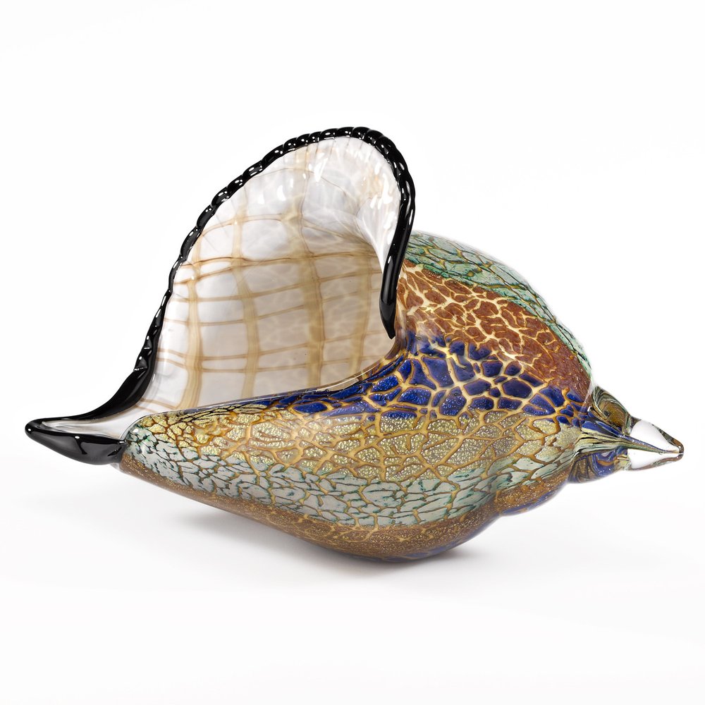 10" Gold Blue Green White Murano Glass Conch Shell Tabletop Sculpture. Sculpture isolated on a plain white background, showing a gold glass surface.
