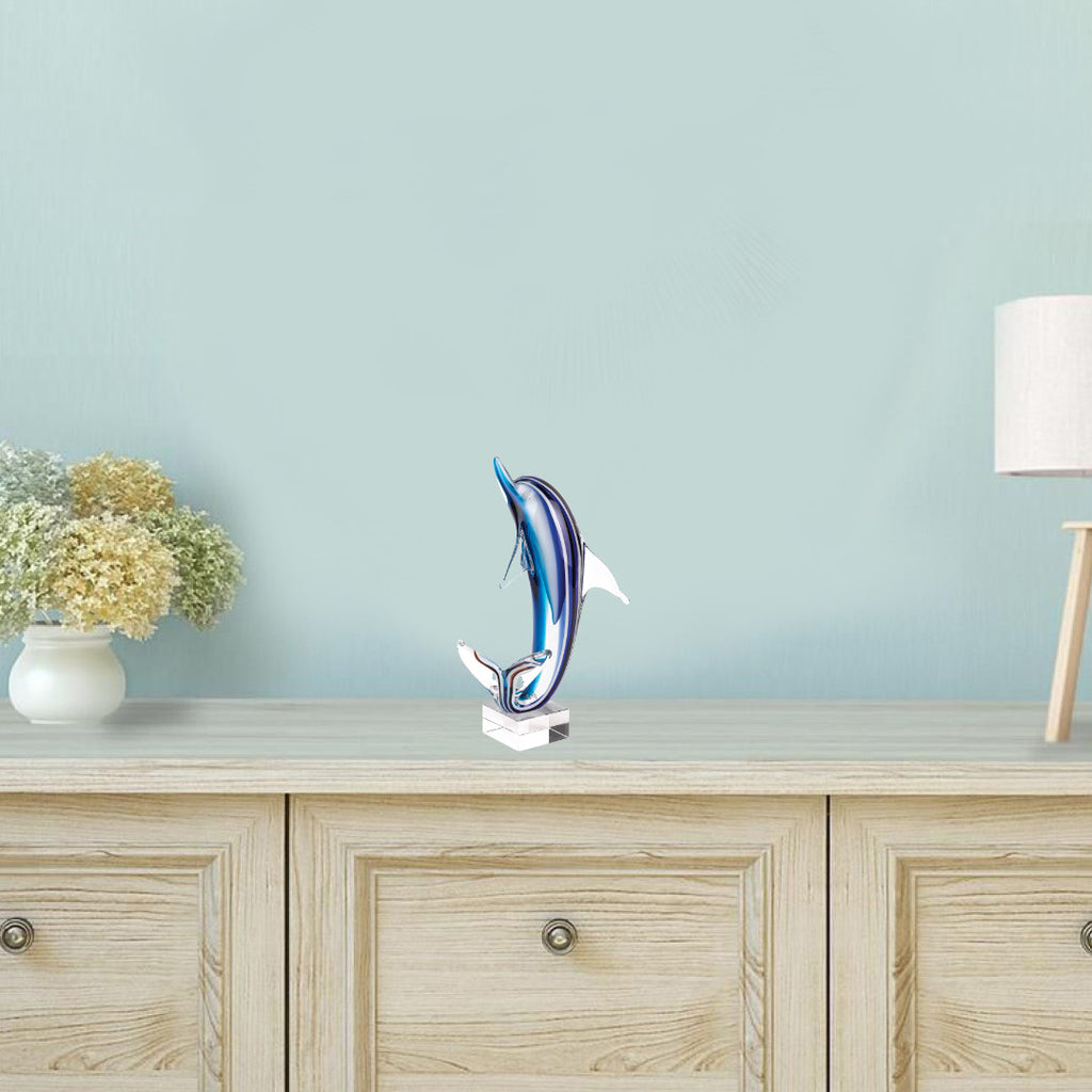 14" Blue Murano Glass Dolphin Figurine Tabletop Sculpture. Sculpture isolated on a plain white background, in a blue glass finish.
