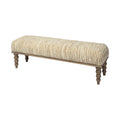Upholstered fabric bench in cream with a textured stripe pattern and turned wood legs on a white background.
