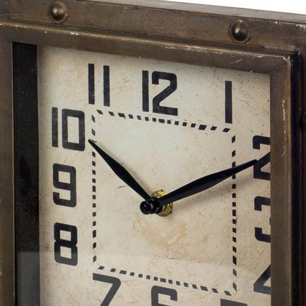 Square Bronze Toned Metal Desk Table Clock With Traditional Black Numbers And Hands in a home interior