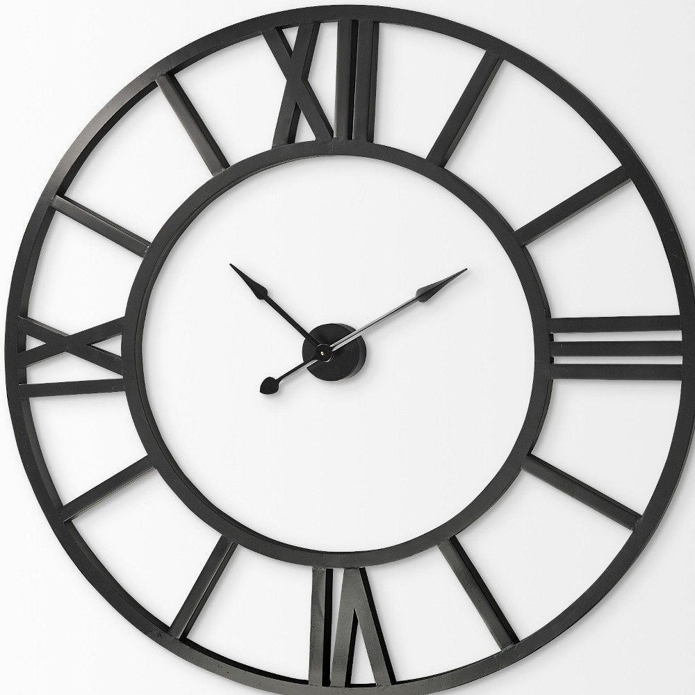 54" Round Xl Industrial Style Wall Clock With Open Face Desing. Wall clock isolated on a plain white background, showing its black color.
