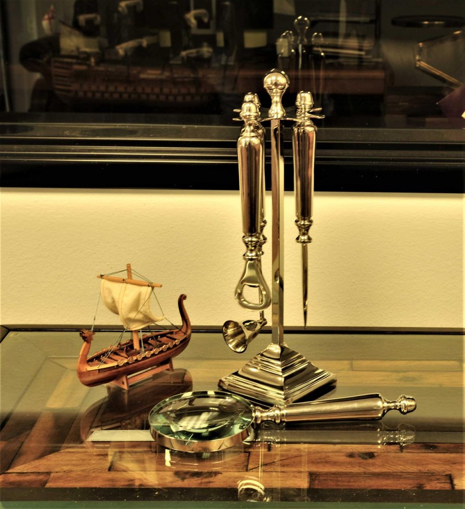 Magnifying Glass Letter Opener Bottle Opener And Candle Snuffer Set