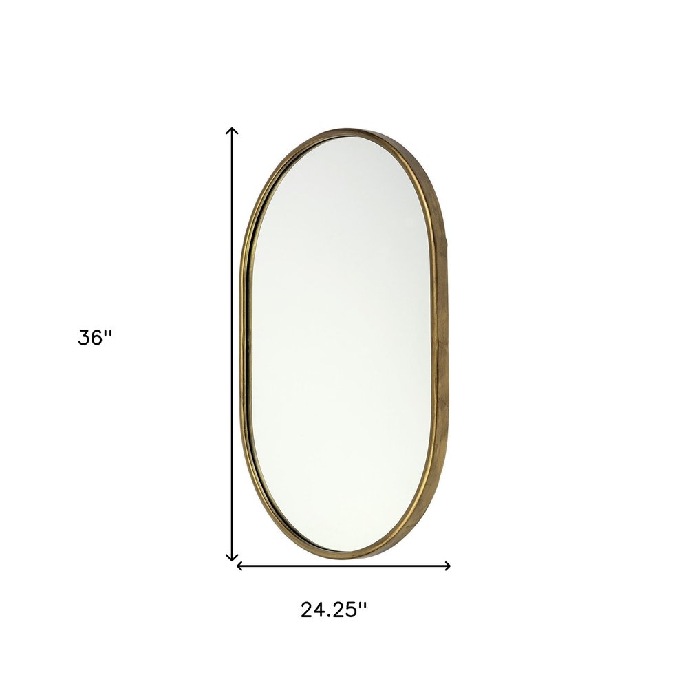 Gold Oval Accent Metal Mirror on a white background