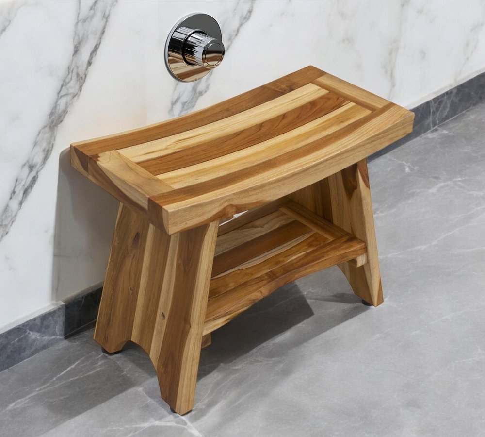 24" Natural Teak Rectangular Shower Bench With Shelf styled in a furnished interior with an off-white wall on a tiled floor.