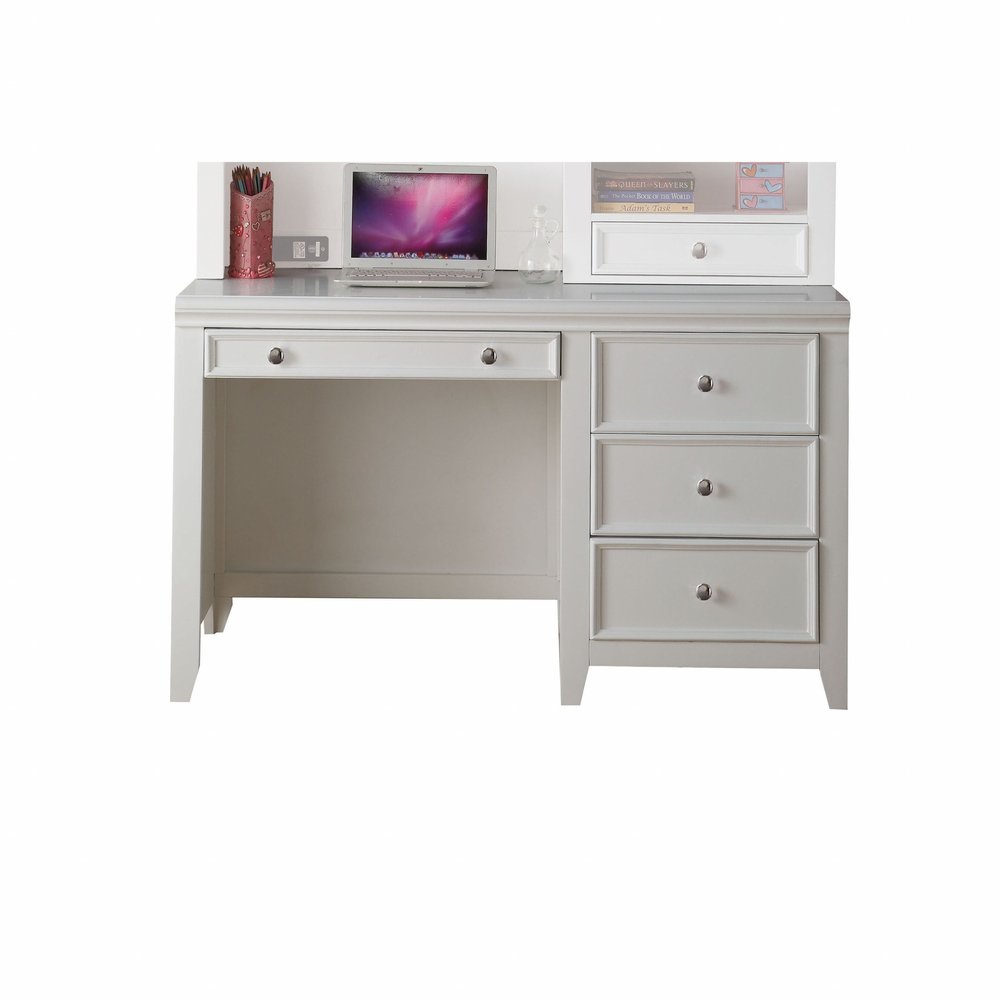 White wood computer desk with keyboard drawer and three side drawers, featuring a hutch with shelves and a laptop.