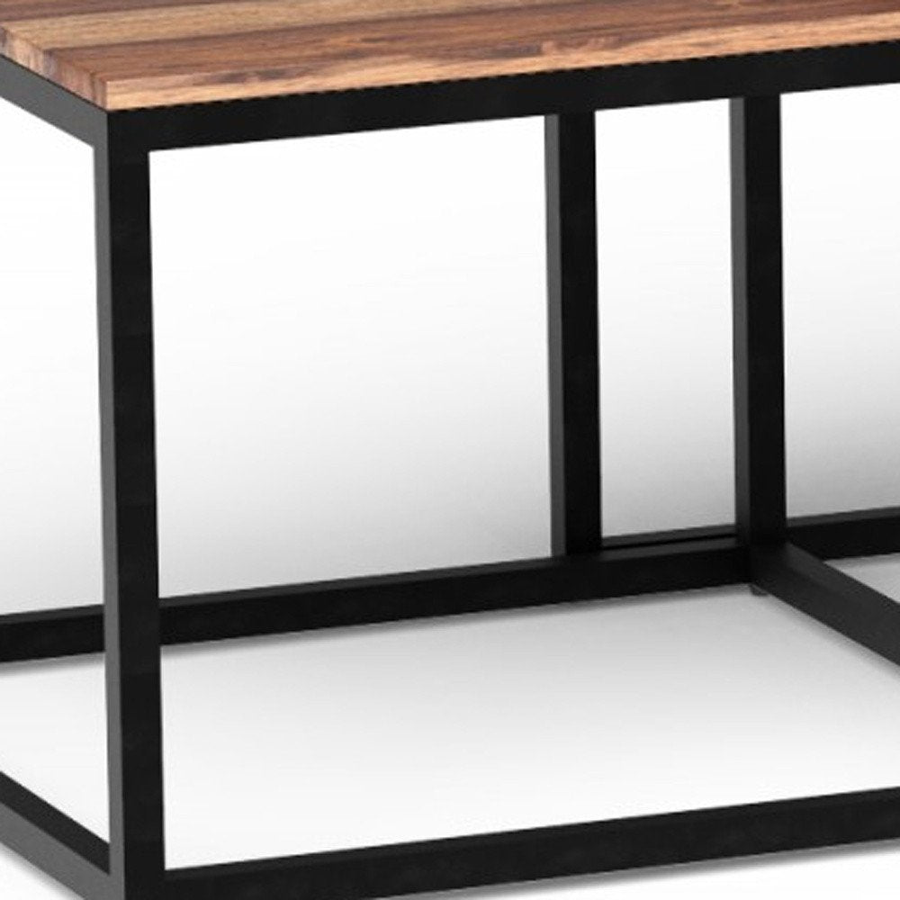 Set of Three 47" Natural And Black Solid Wood And Iron Coffee Table on a white background