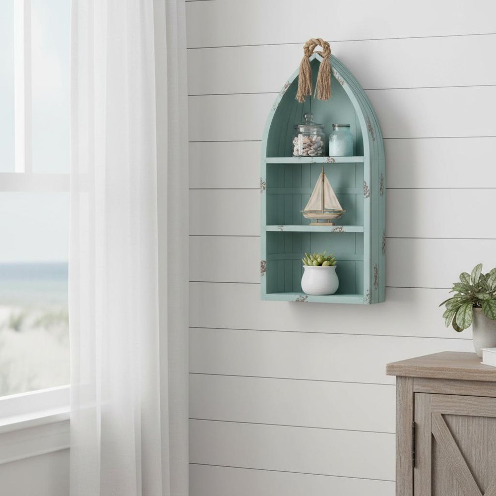 34" Aqua Blue Wood Canoe Hanging Shelf styled in a furnished interior with an off-white wall on a tiled floor.