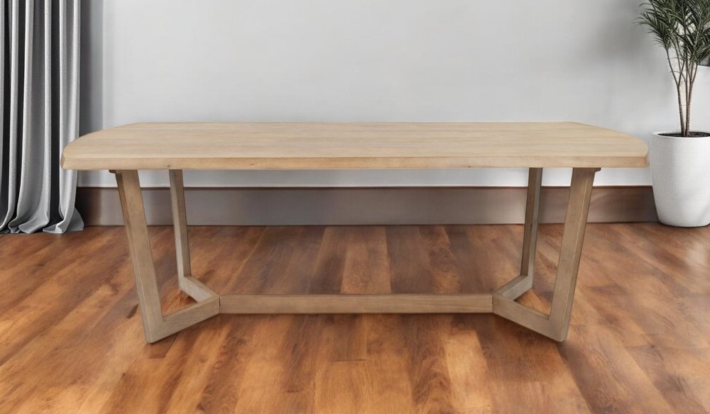 92" Natural And Brown Solid Wood Trestle Base Dining Table in a home interior