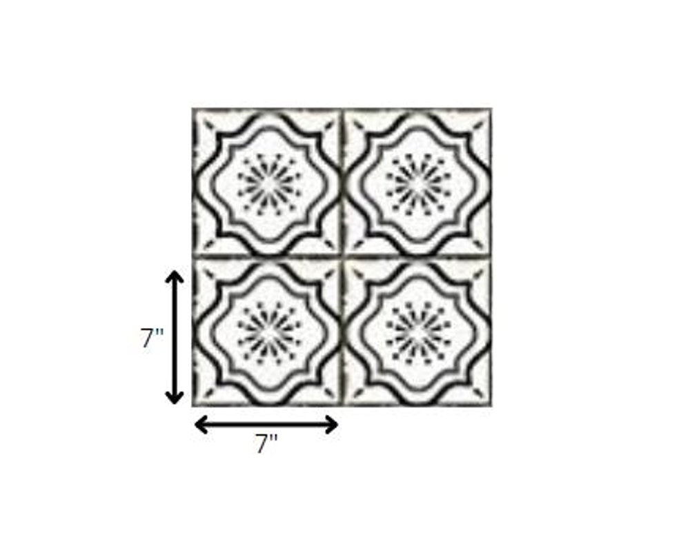 Four 7" x 7" black and white mosaic tiles with a floral pattern, arranged in a 2x2 grid.