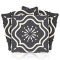 Six by six inch gray and white peel and stick tiles with a floral pattern on a white background.