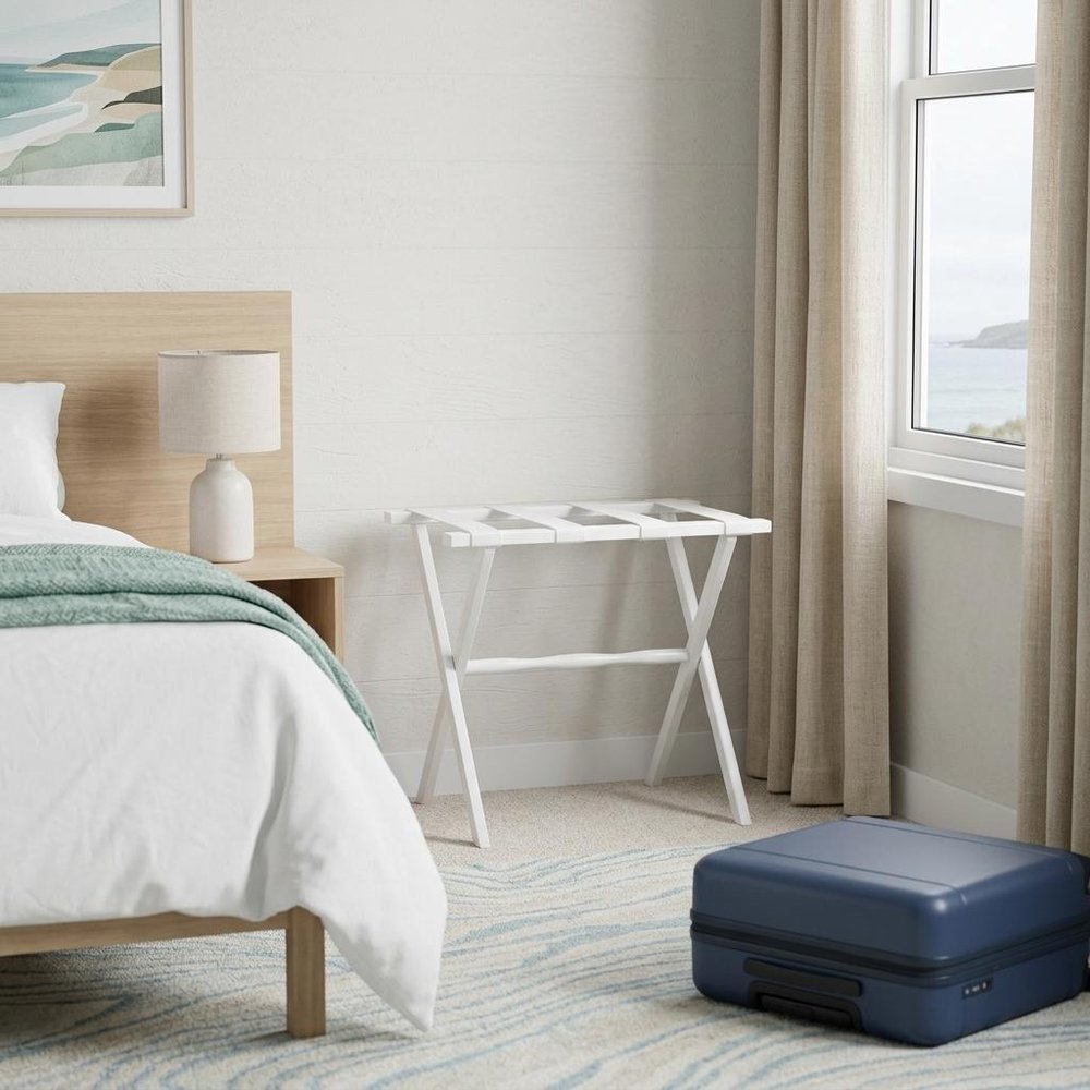 Hotel White Finish Wood Folding Luggage Rack With White Straps in a home interior