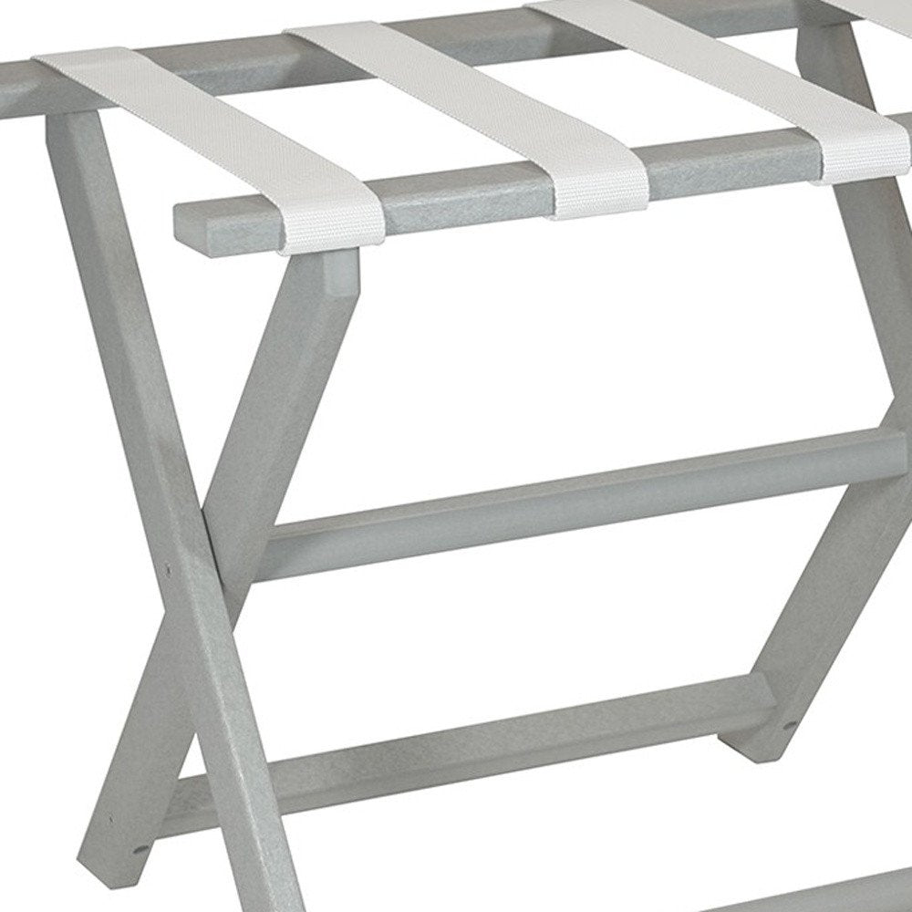 Earth Friendly Light Gray Folding Luggage Rack With White Straps on a white background