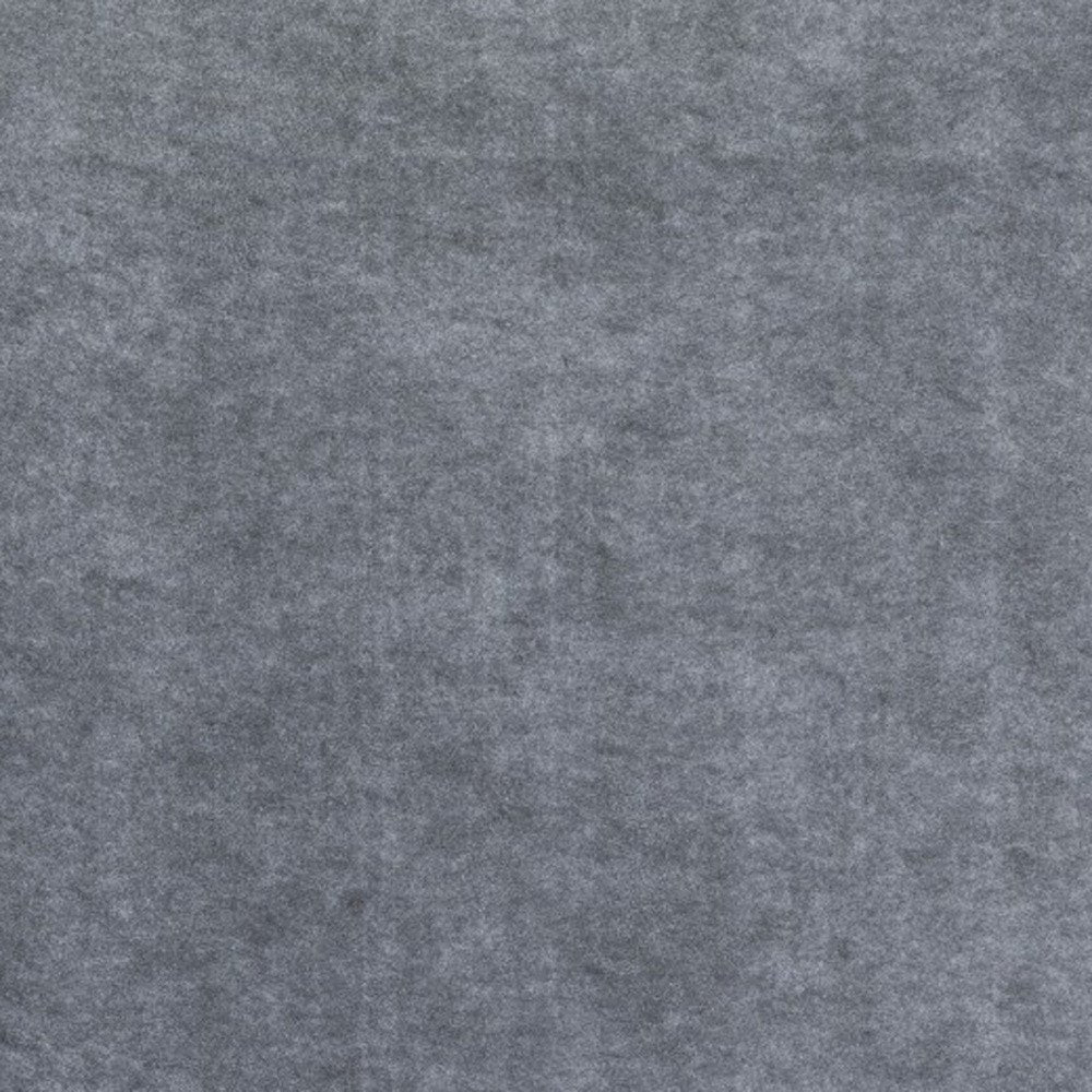 6' x 9' Gray Non Slip Rug Pad close-up highlighting the gray plastic surface.