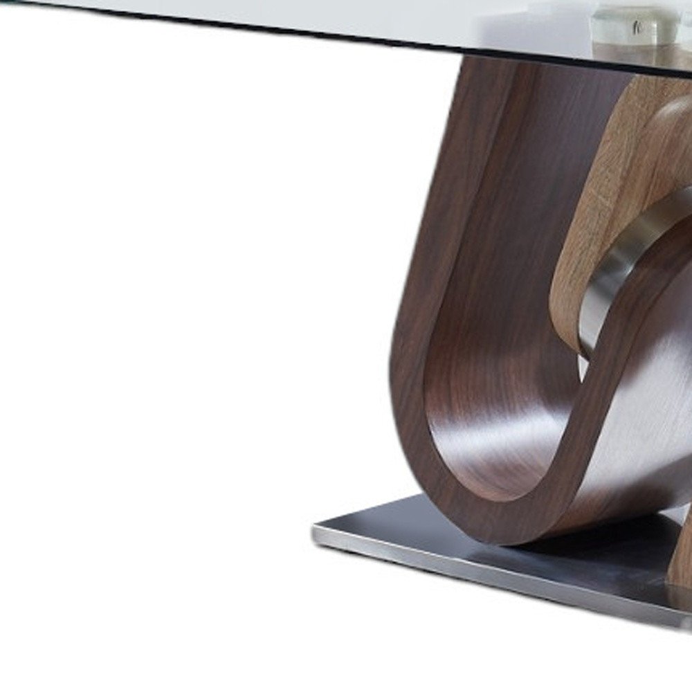 71" Clear And Brown and Silver Glass And Stainless Steel and Manufactured Wood Pedestal Base Dining Table on a white background