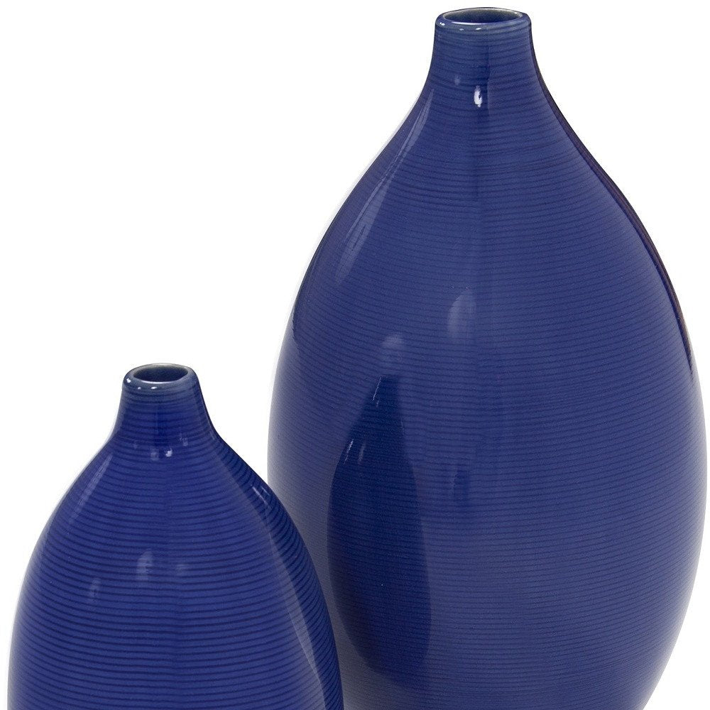 Set of Two Cobalt Ceramic Round Table Vases on a white background